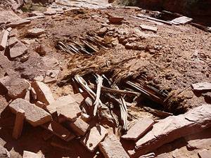View of a partial intact roof on one of the kivas